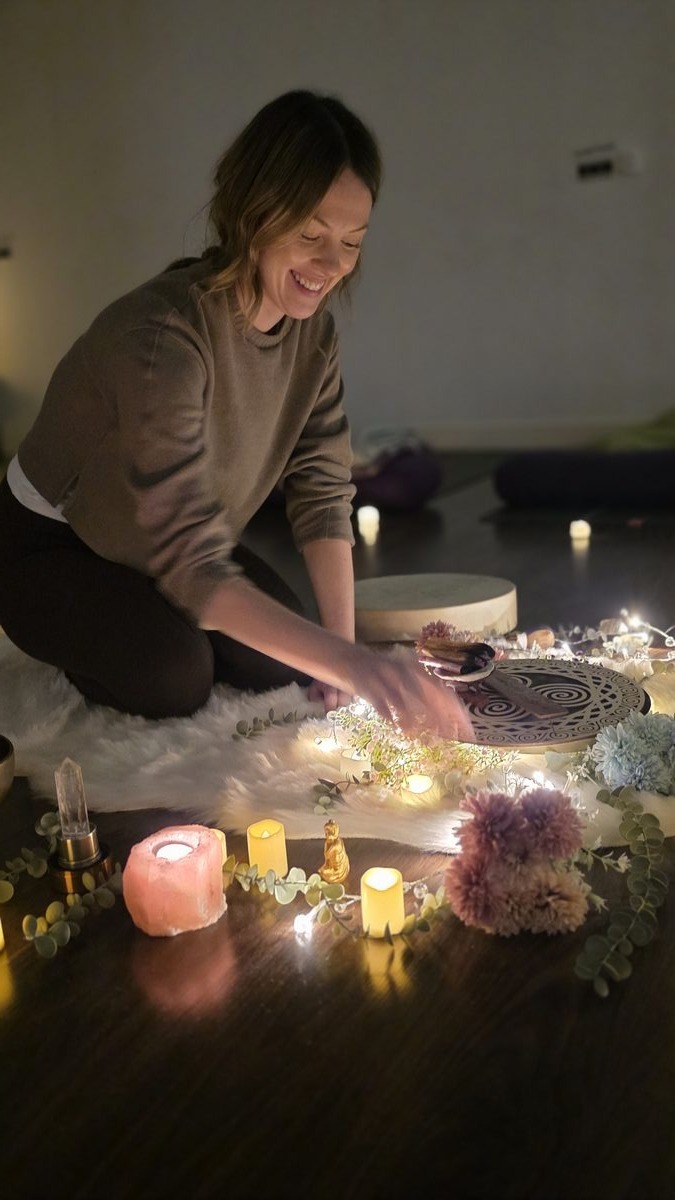 Orla with frame drum at a breathwork workshop, Dublin